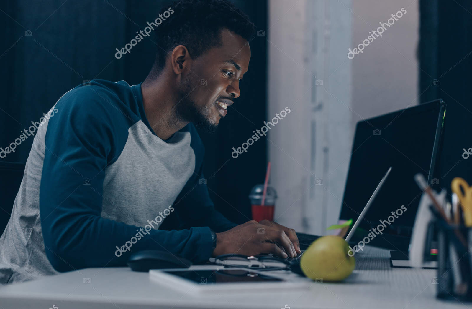 depositphotos 296547002 stock photo cheerful african american programmer working